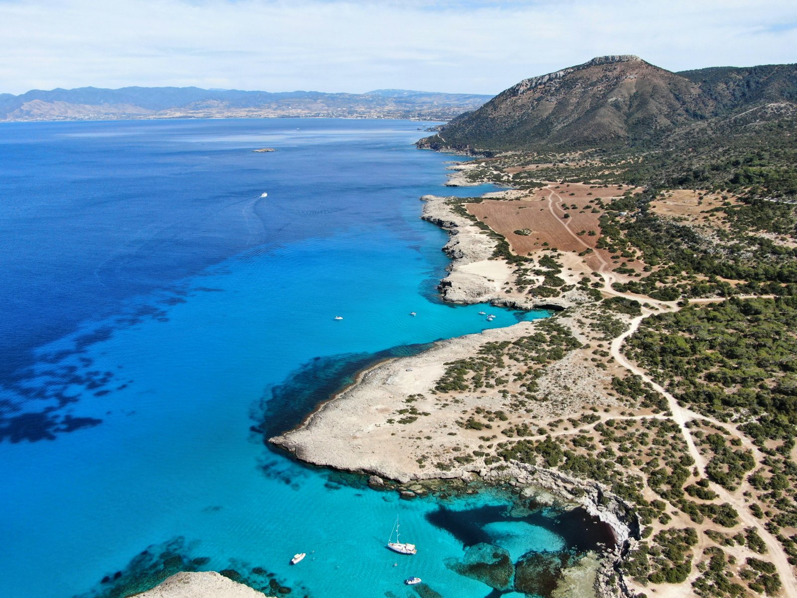 Turquoise water and limestone coastline in the Paphos region of Cyprus